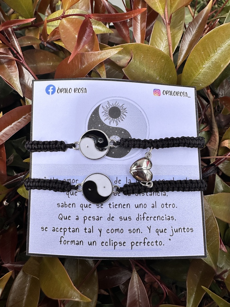 Pulseras clic yin-yang.