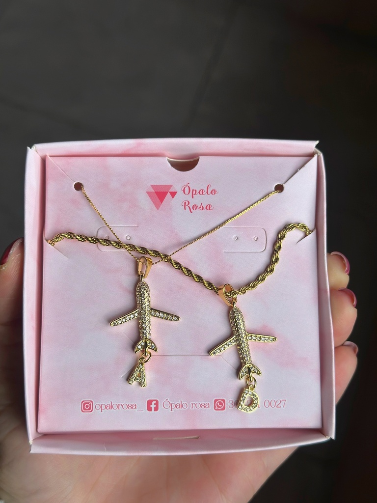 Cadenas avión pareja de lujo 
